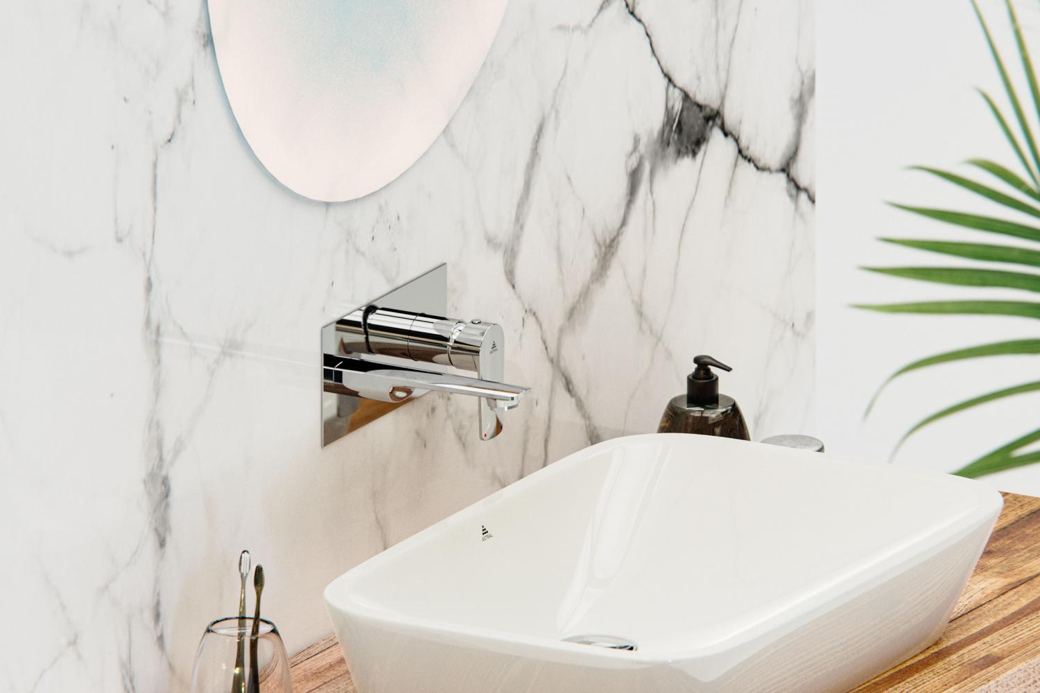 Baño de lujo con encimeras de mármol y grifo monomando cromado empotrado, combinando elegancia y funcionalidad.