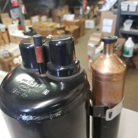 por que está negro el aceite de un compresor de aire acondicionado